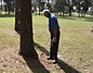 How to Hit Your Golf Ball When It's Stuck Against a Tree Trunk